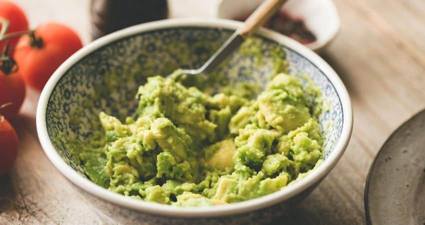 mashed avocado in a bowl.