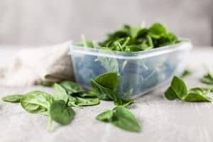 spinach in a plastic container