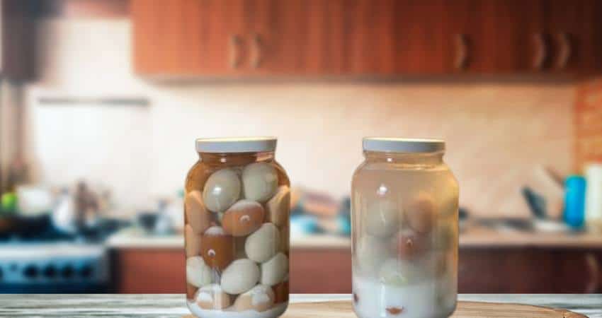 Eggs stored inside jars filled with pickling lime