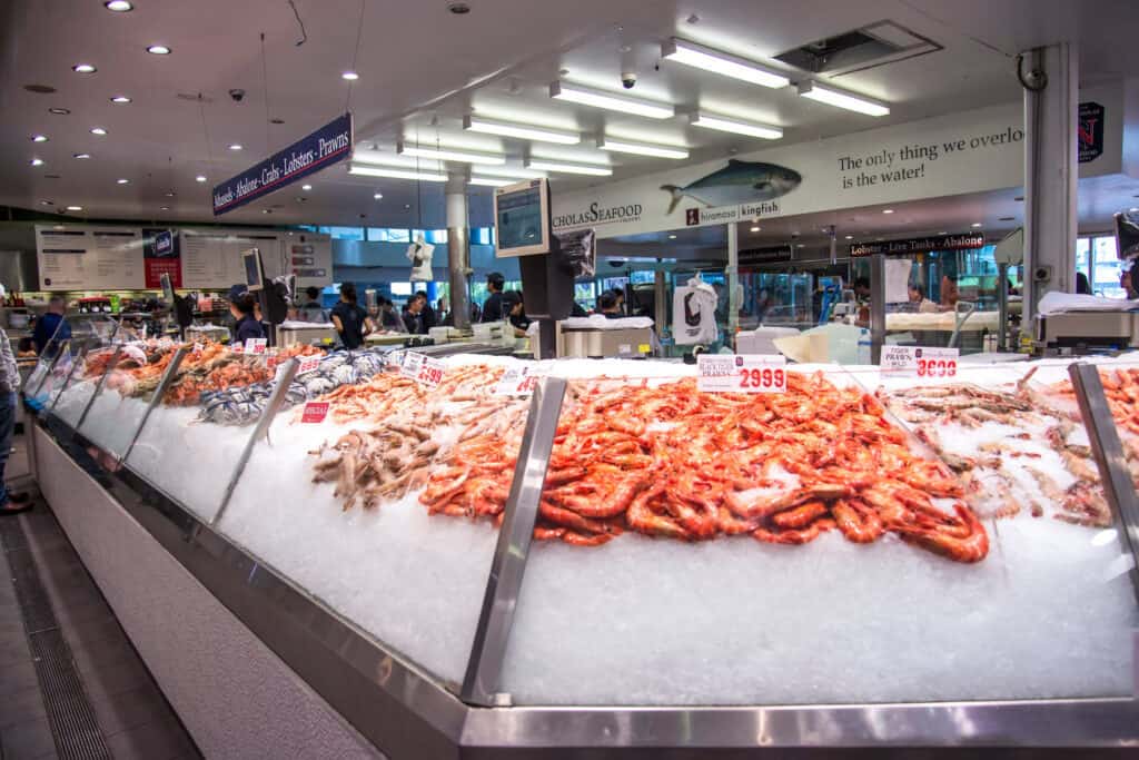 Tilapia, salmon and other seafood in the seafood market.