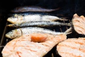 sardines vs salmon on a grill