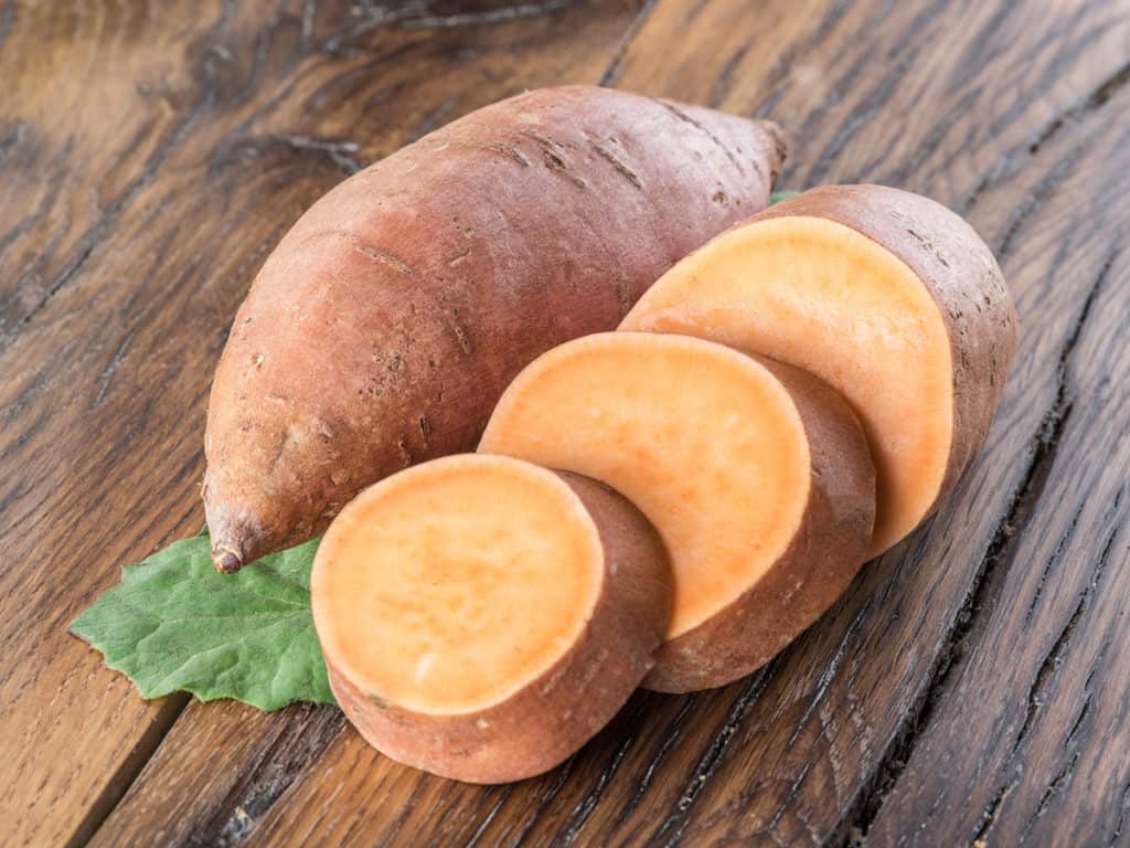 A raw sweet potato.