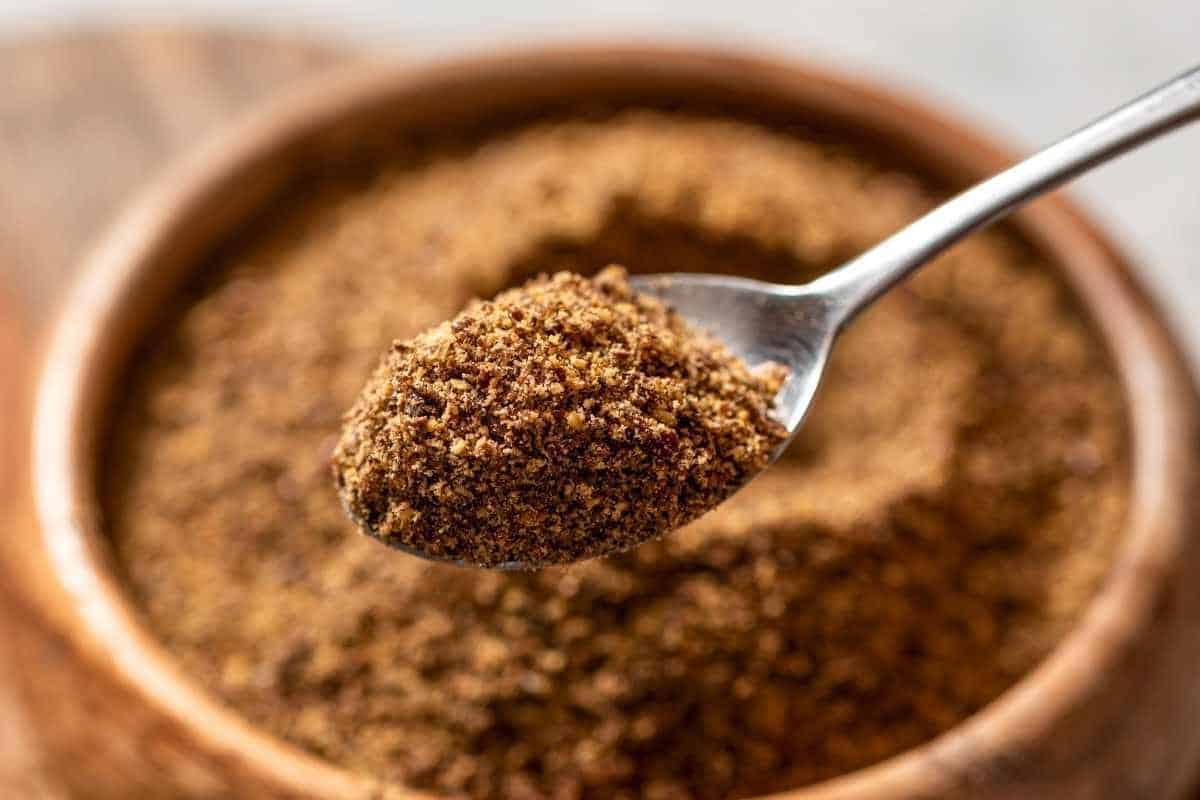 ground flaxseed on a spoon