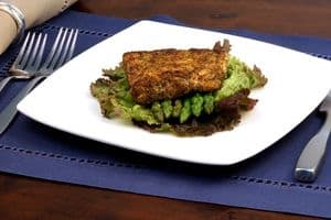 sea bass dinner on a plate with asparagus