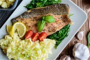 rainbow trout dinner on a plate