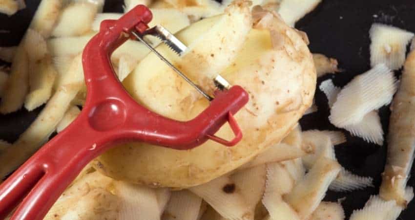 peeling Yukon Gold potatoes