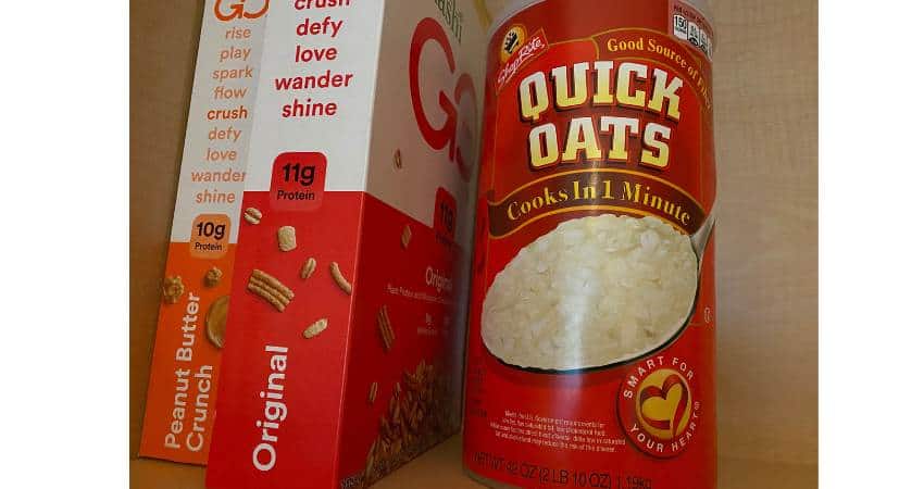 Kevin Garce storing oatmeal in his kitchen cabinet at home.