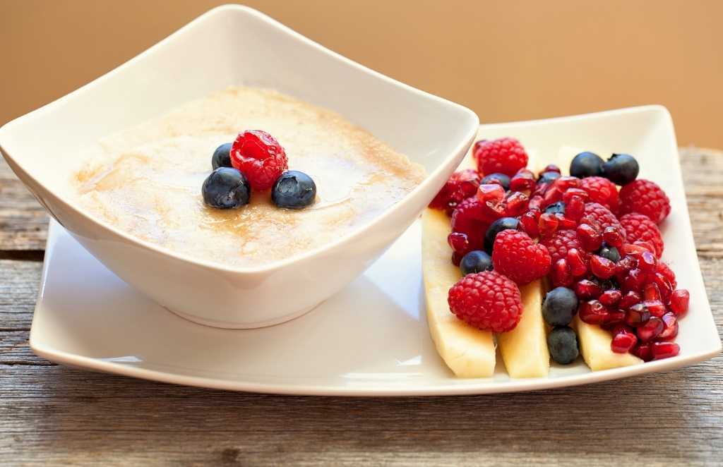 a bowl of cream of wheat with fruit