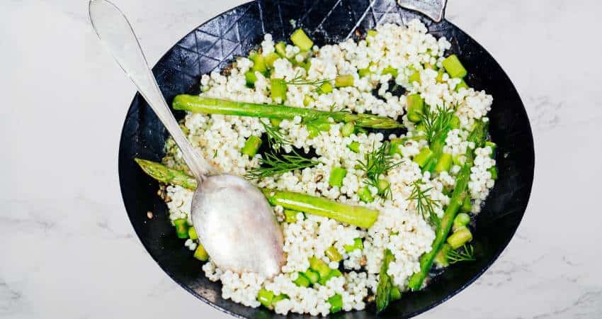 Cooked barley with asparagus.