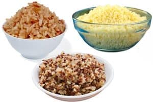 cooked couscous, brown rice and quinoa in bowls