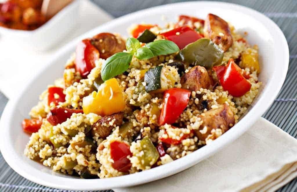 cooked couscous with vegetables in a bowl