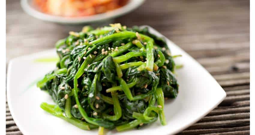 Cooked spinach as a side dish.