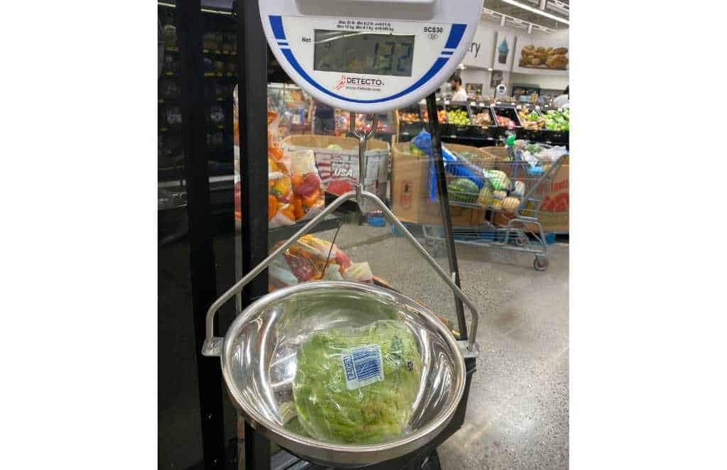 weighing iceberg lettuce at my local supermarket