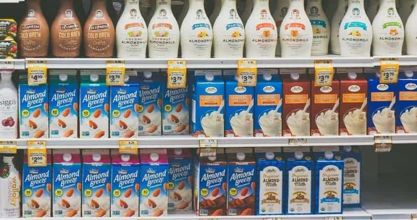 different types of almond milk in the store