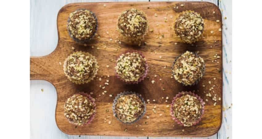 Hemp seeds on top of mini muffins