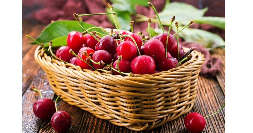 Cherries in a basket.