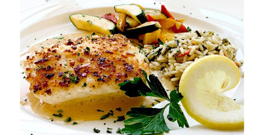 Halibut dinner with rice and vegetables.