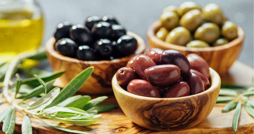 Popular types of olives in bowls.