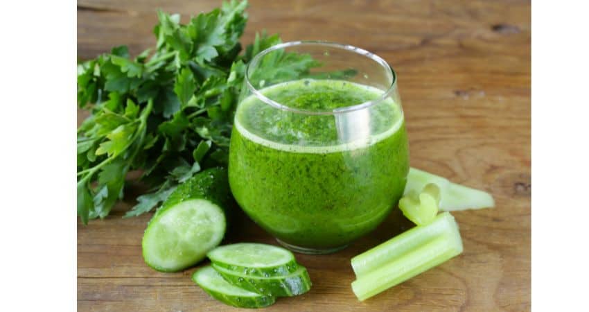 Spinach juice with celery and cucumbers.