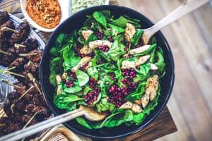 Spinach Salad With Pomegranate in a Bowl.